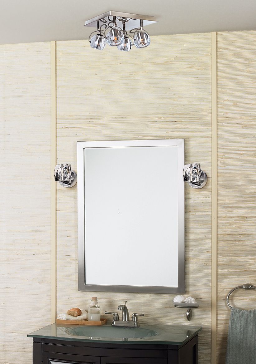 Chrome and crystal bathroom light fixtures make this room extra special.